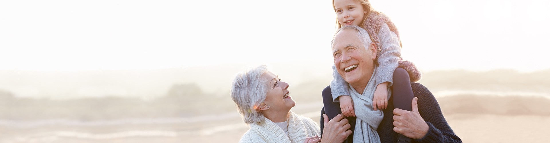 senior couple with their granddaughter on grandpa